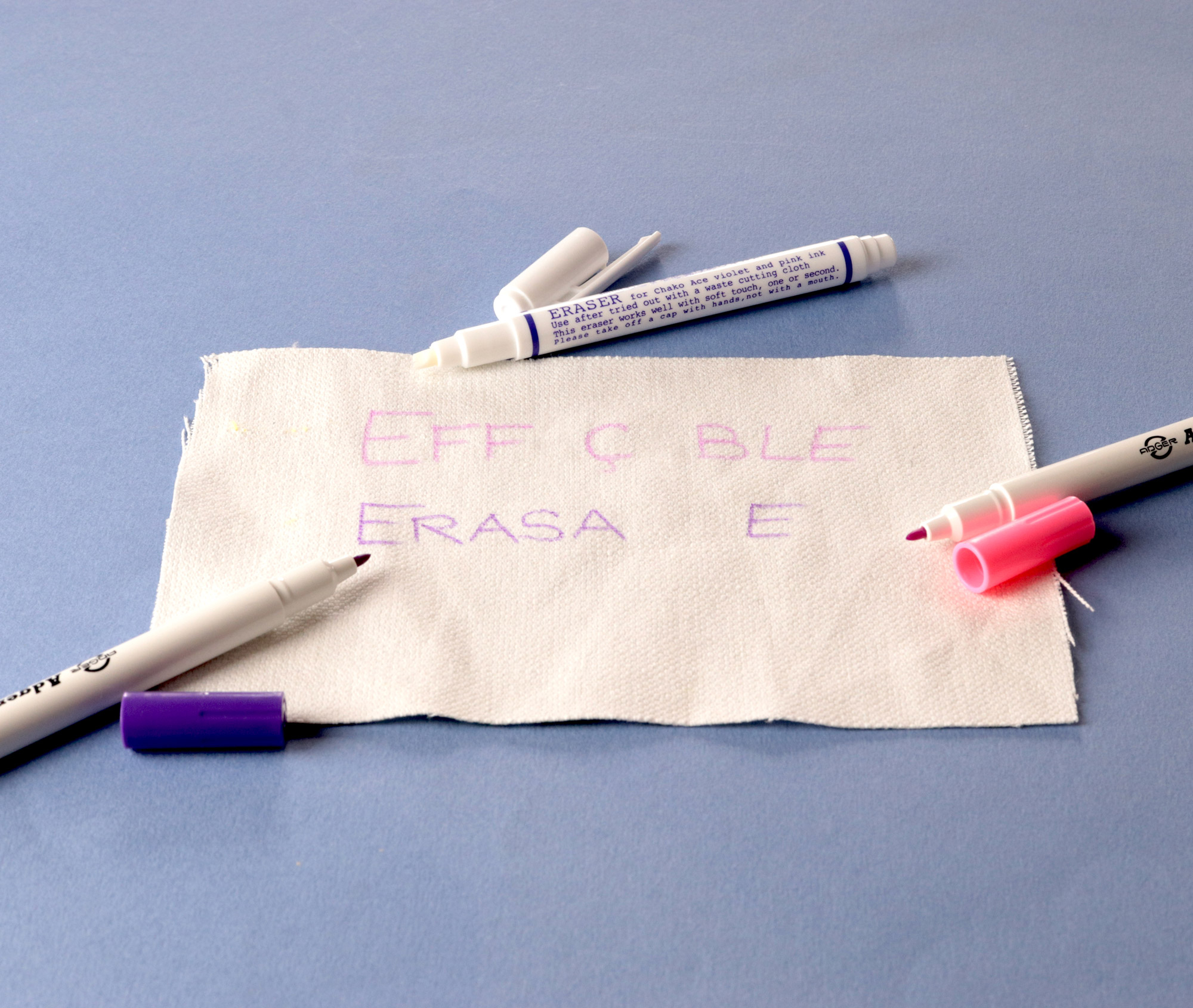 Eraser for pink and purple fabric markers
